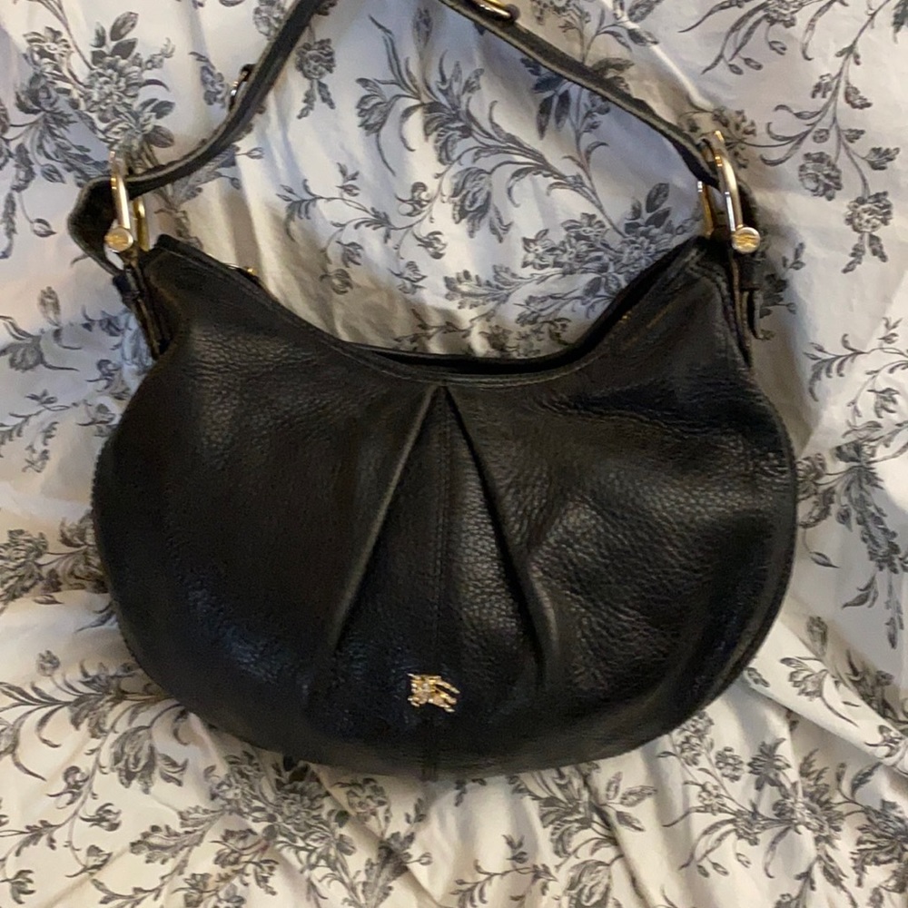Burberry black hobo style purse comes with dust bag.